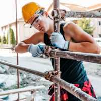 Construction worker working on scaffolding
