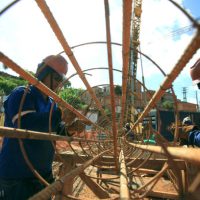 salvador, bahia, brazil - march 23, 2017: Workers working on construction of a bus station in Salvador city.