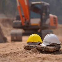 safety-helmet-construction-site-road-construction-site-background-safety-concept_369024-360