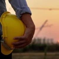 silhouettes-engineers-workers-working-real-estate-project-site-industrial-building-preparing-finish-work-evening_369024-1132